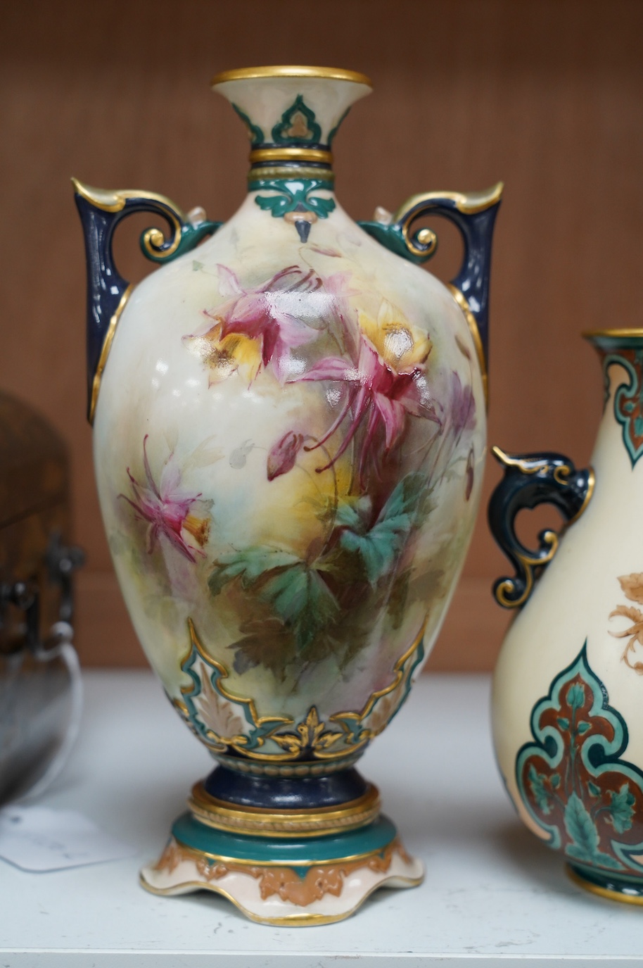 Hadley's Worcester: a pair of vases and two others, tallest 21.5cm. Condition - mostly good, largest vase has two chips to inner upper rim, areas of wear to gilding